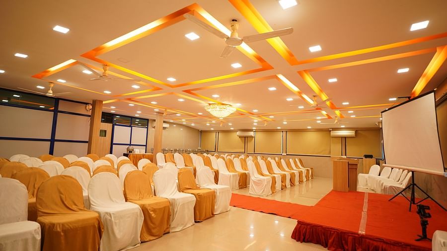 an image of a event space with chairs arranged for a function at  City Centre Residency, Bangalore