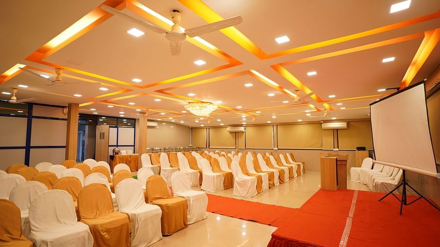 an image of a event hall with a projector and a white screen at  City Centre Residency, Bangalore