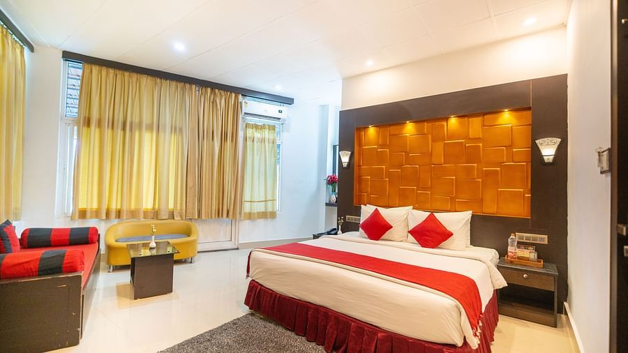 Image of a room with a bed window on the side at Coorg Jungle Camp Backwater Resort, Kushalnagar.
