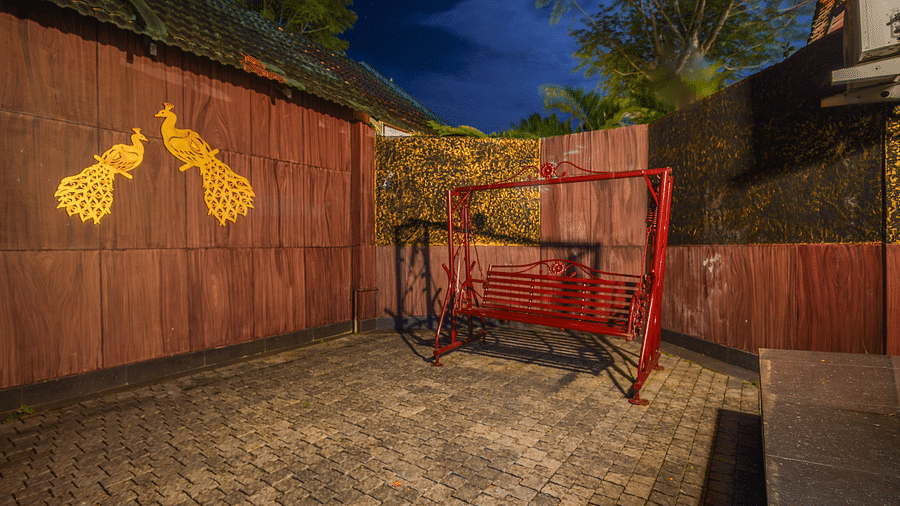 Image of a kids play area with swings at Coorg Jungle Camp Backwater Resort, Kushalnagar.