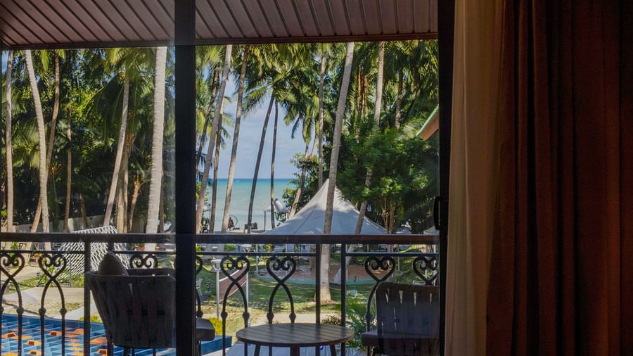 Image of the picturesque view of the nature from the balcony of Coral Teal Suite at Coral Reef Resort and Spa in Havelock