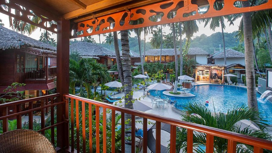A picturesque view of the swimming pool seen from the balcony of Coral Turquoise at Coral Reef Resort and Spa in Havelock