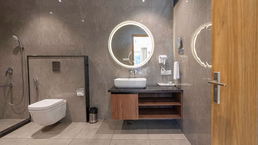 interior of the bathroom in the mountain view room at Corbett Four Seasons, Ramnagar