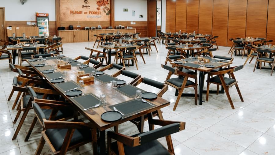Shot of the restaurant at the resort with table and chairs all around.