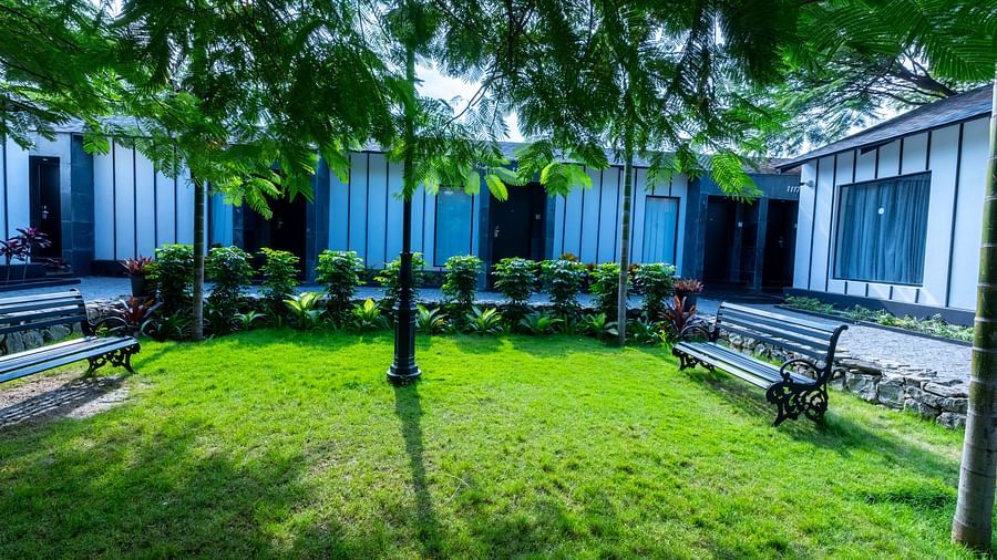 exterior image of the garden room compound opening to a lush green garden - Darza Resorts