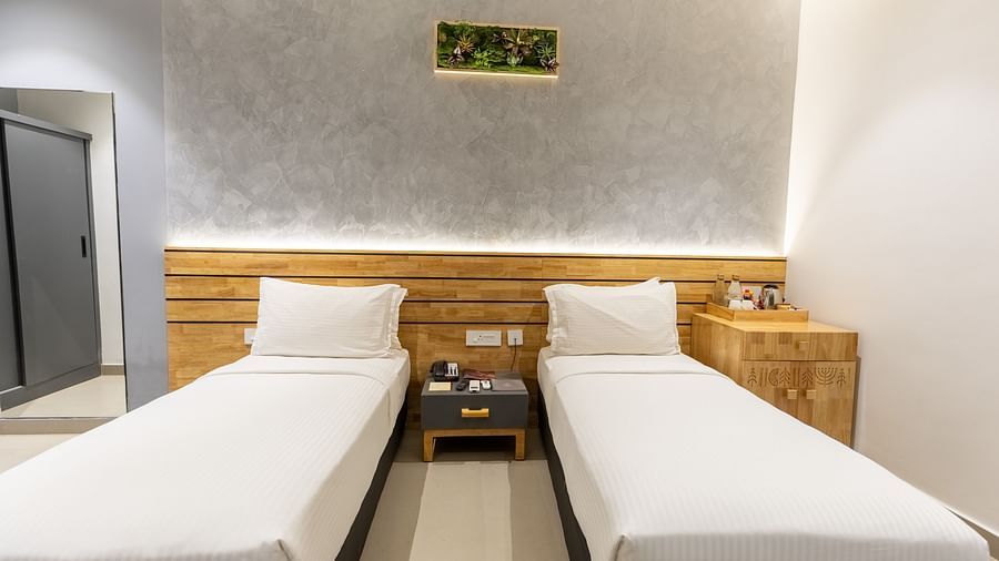 front view image of the plush twin beds at the luxury group stay villa - Darza Resorts
