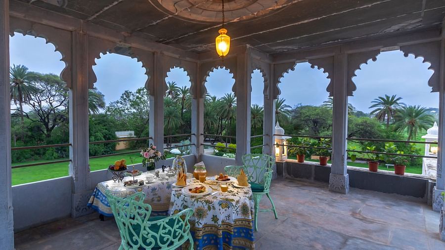 image of an intimate dining arrangement at Dev Shree, Deogarh overlooking beautiful views