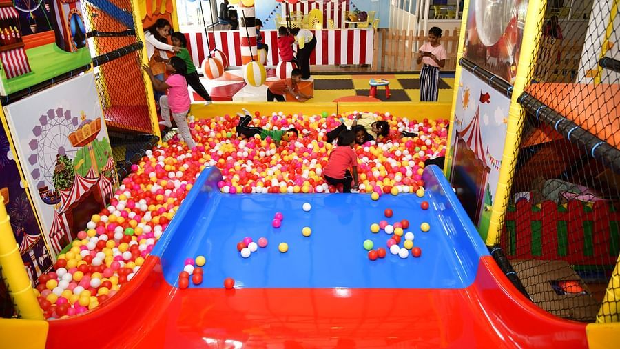 Children playing in a colorful ball pit at an indoor play area | Diamond Parks, Pune 