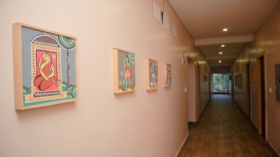image of the lobby at dip holidays with paintings hung on the wall at equal distances