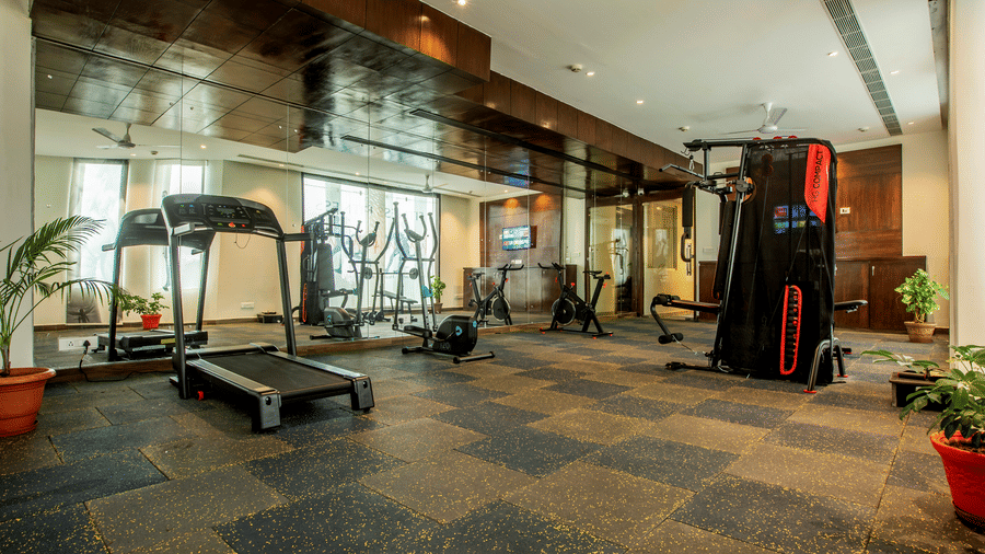 Fully equipped fitness centre with treadmills and weight machines - Eastlynn Resort, Rishikesh