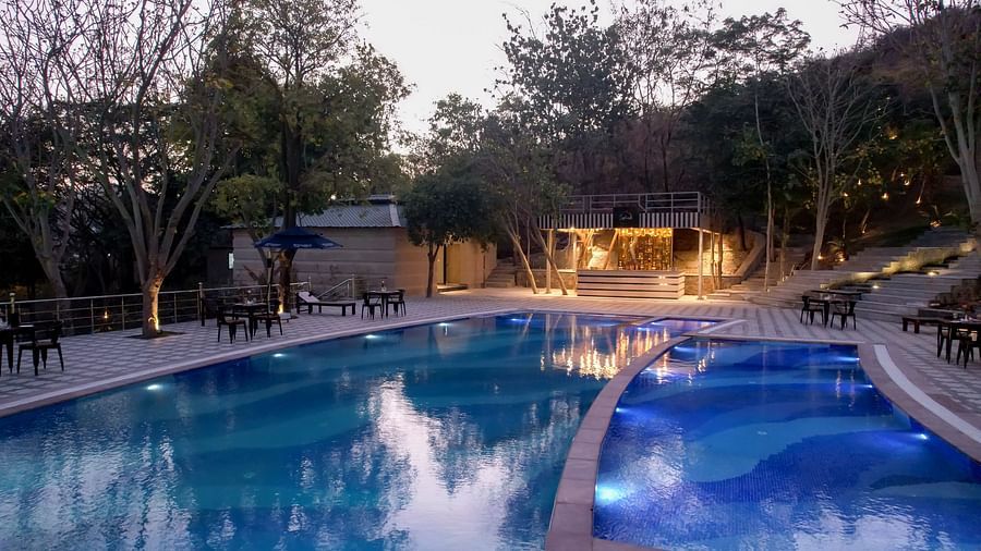 A view of the swimming pool at Essentia Luxury Resort & Spa, Udaipur.