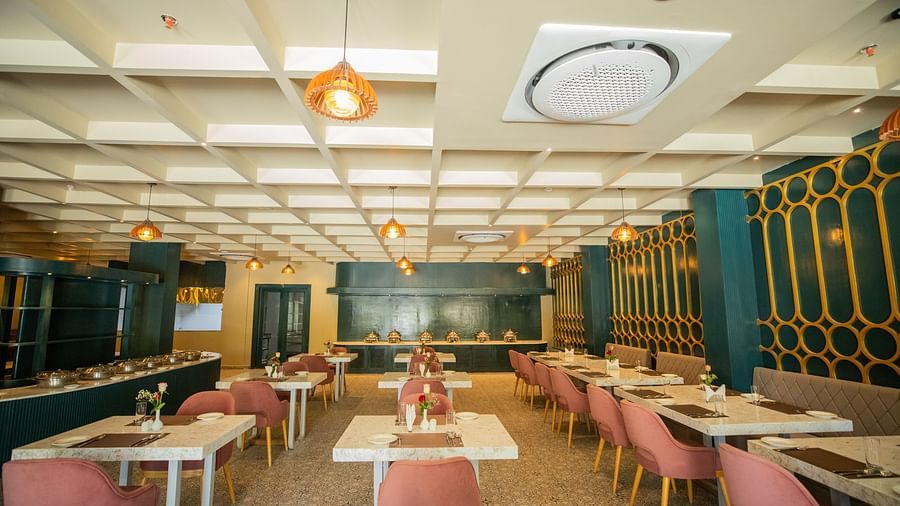 A dining setting of Blue Salt and Coffee at Essentia Luxury Resort & Spa, Udaipur. 