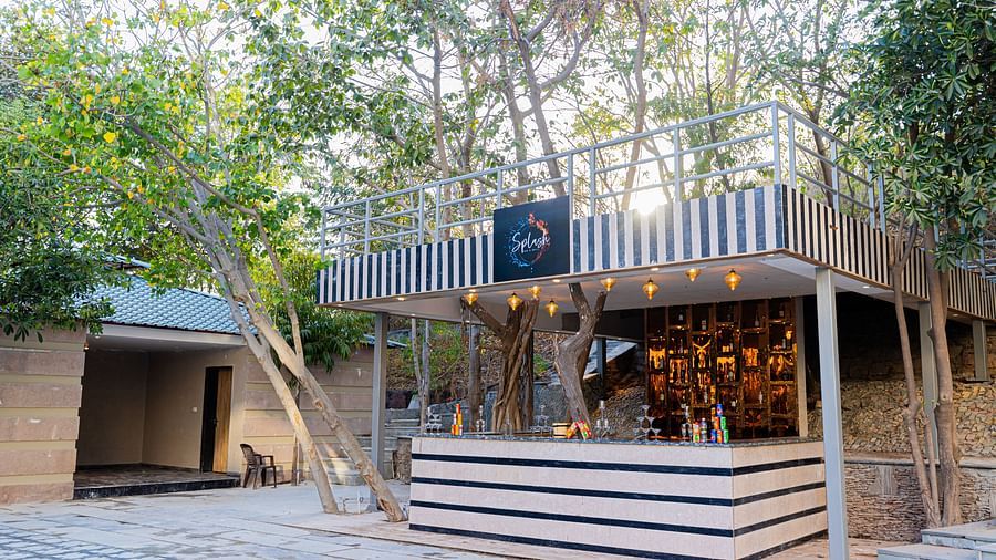 A view of Splash Bar and Grill counter placed outside at Essentia Luxury Resort & Spa, Udaipur.
