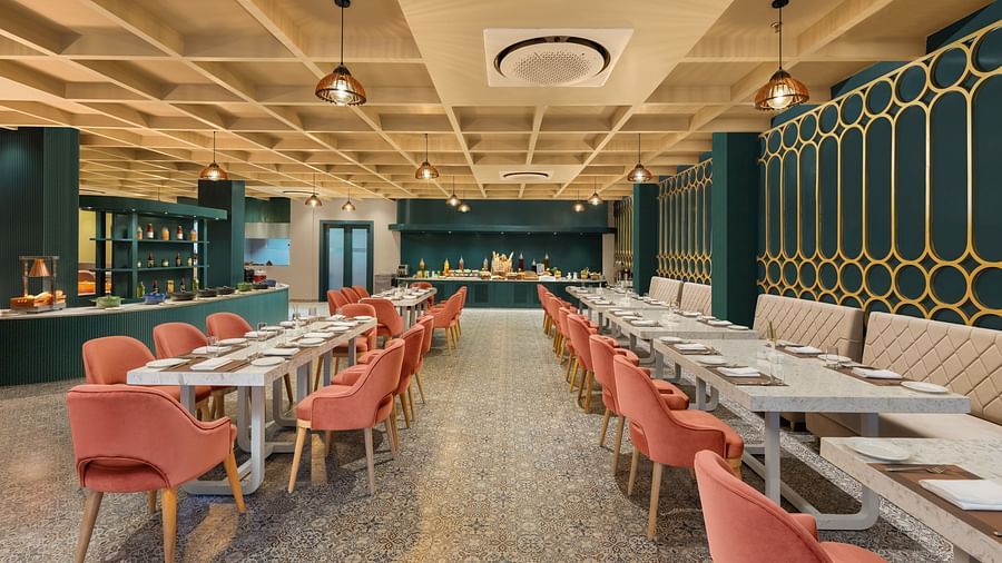 A dining setting of Blue Salt and Coffee at Essentia Luxury Resort & Spa, Udaipur.