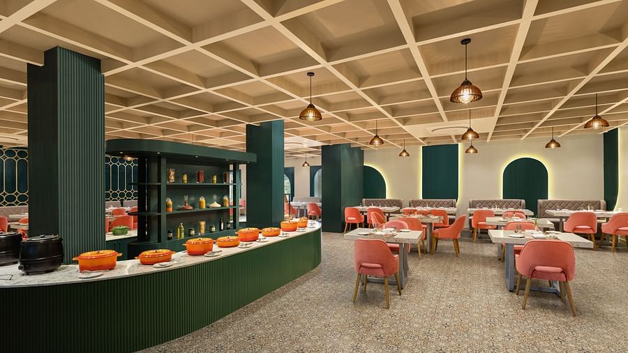 A dining setting of Blue Salt and Coffee at Essentia Luxury Resort & Spa, Udaipur.