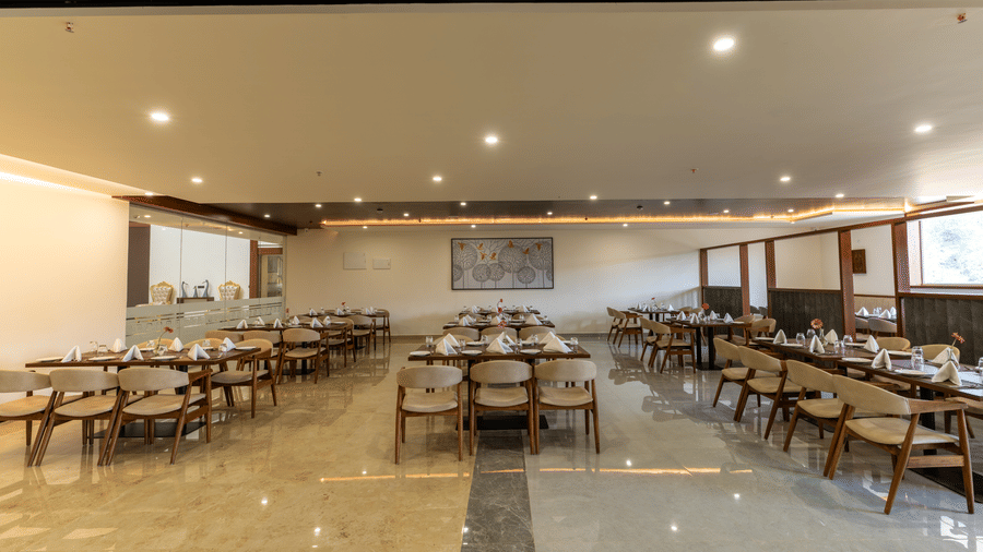 Cirton 1 dining area  interior featuring a counter and seating areas at Essentia Resort & Spa, Sirsi 