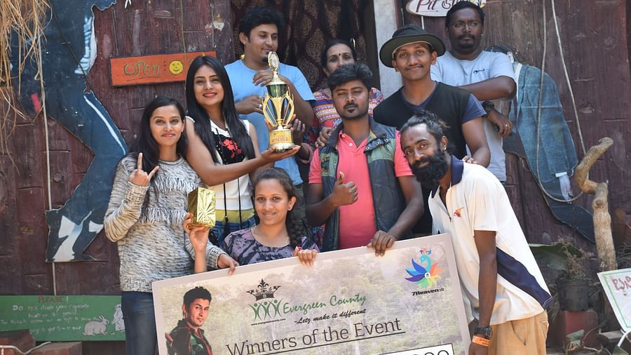 A group of friends showcasing their achievement - Evergreen County 