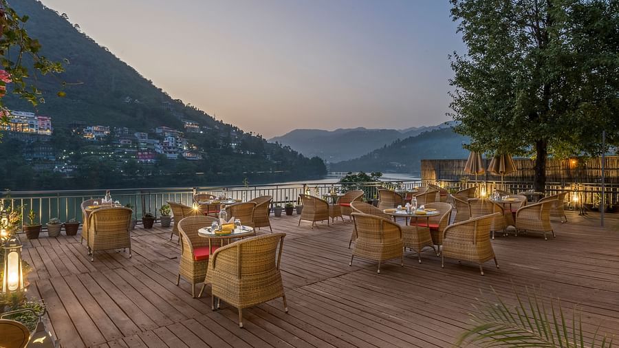  Outdoor L-Attitude Deck at Fishermen's Lodge, Bhimtal, offering a beautiful view, perfect for enjoying the serene landscape.
