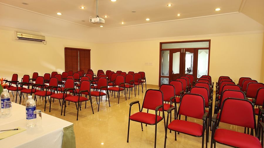 Banquet hall with chairs neatly arranged, ready for the celebration from the front