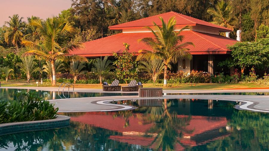 Gamyam Retreat, Kumta - The restaurant building at our resort in the backdrop of the swimming pool