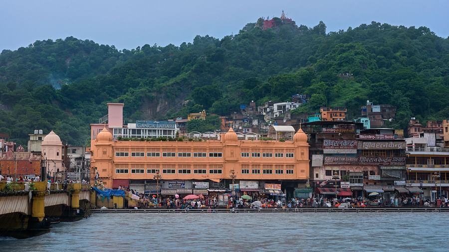 Facade of the hotel shot from across the river during daytime - Ganga Lahari, Haridwar