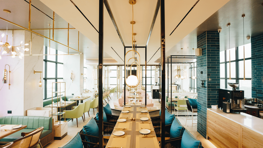 An overview of the seating arrangement inside Zaika Restaurant - Gemini Contental.