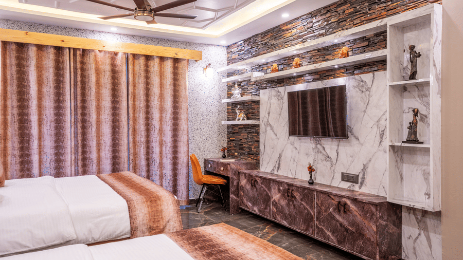 A sophisticated TV entertainment unit with marble accents and a workspace area - Golden Oak By The Lake Hill, Khurpatal