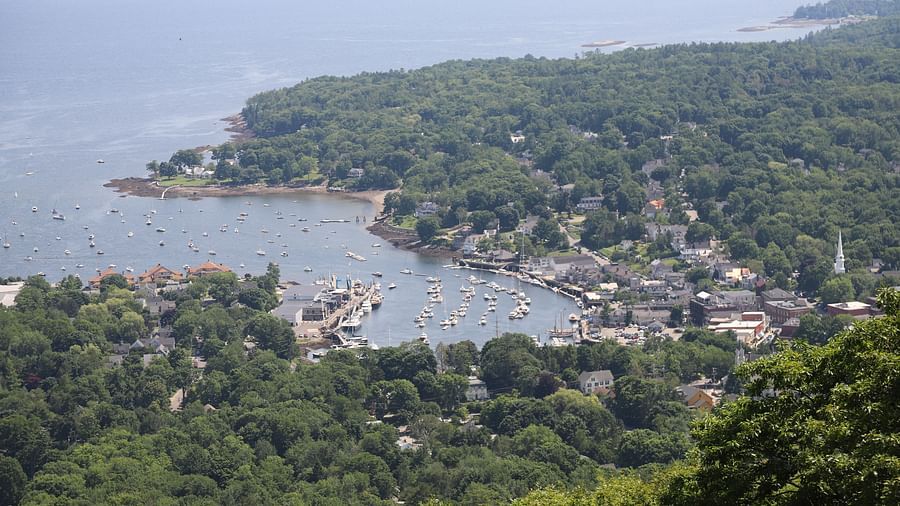Aerial view of Camden Harbor and surrounding landscape near Hartstone Inn.