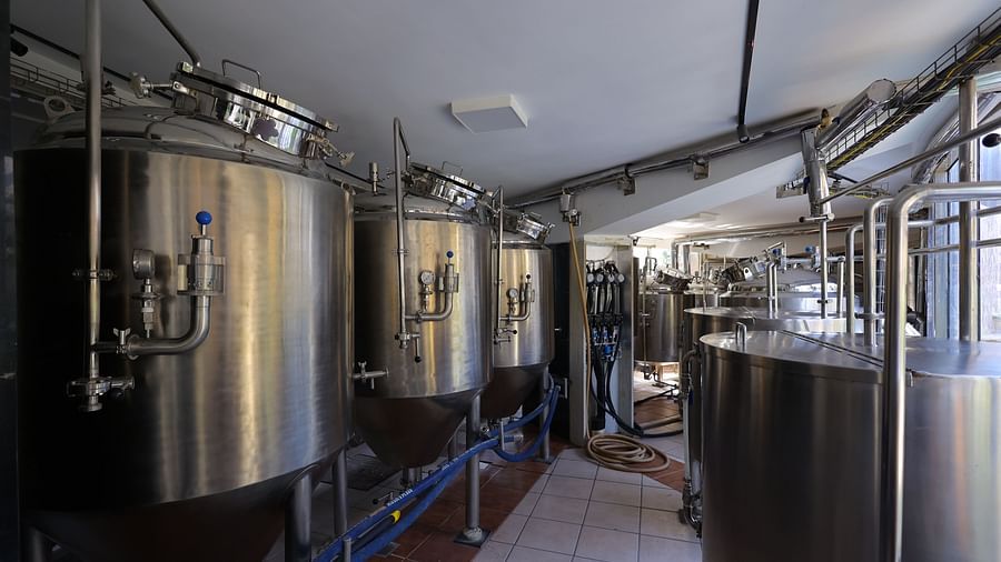 Image of  a brewery setup of Hotel Amar with huge steel containers