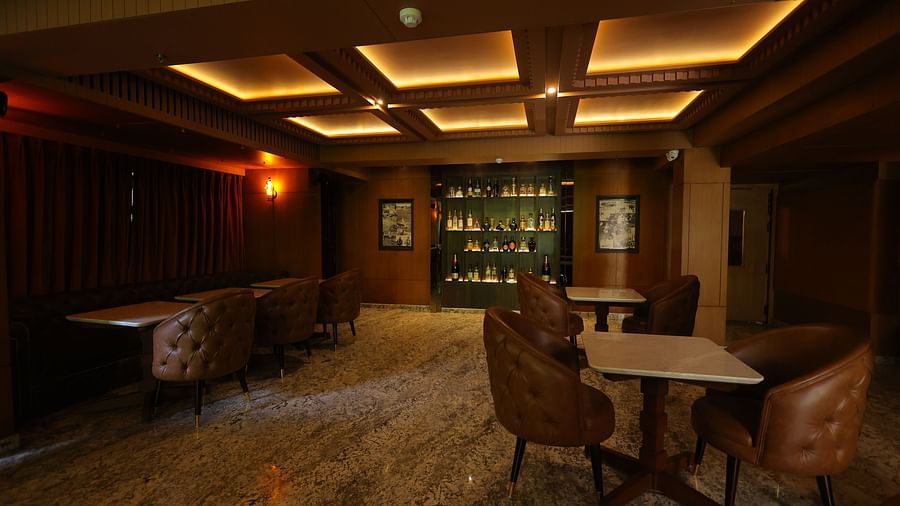 Image of JBs lounge with ambient lighting chairs and tables