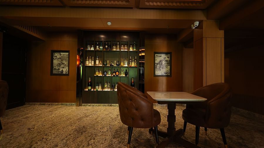 Wide angle image of a fully stocked bar rack at JBs lounge of Hotel Amar