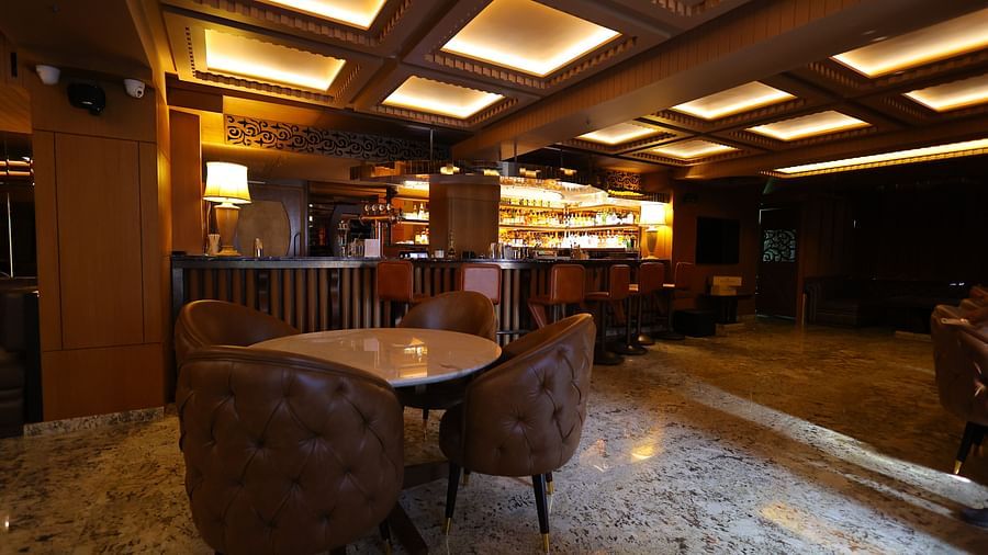 Close up image of seating arrangement of JBs lounge with chairs and tables