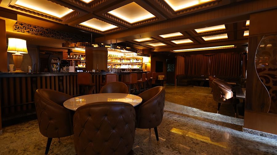Image of seating arrangement of JBs lounge with chairs and tables