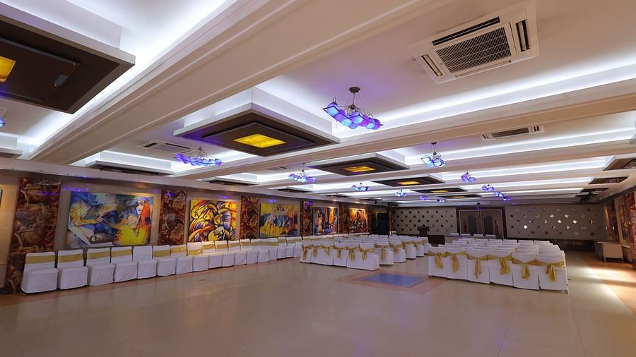 Image of Amar Convention Centre hall in Hotel Amar with theatre seating arrangement of chairs