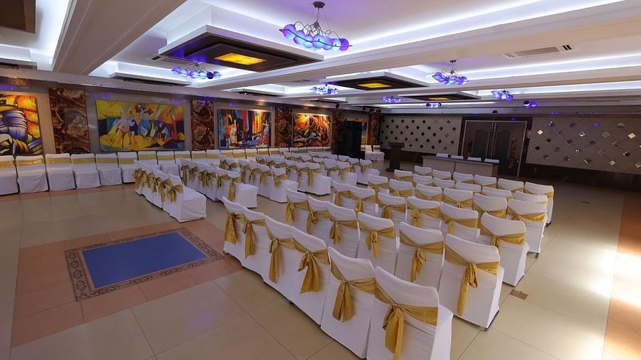 Image of Amar Convention Centre hall in Hotel Amar with classroom seating arrangement of chairs