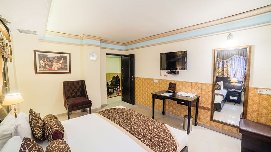 Queen Room featuring a bed and interior decor. - Hotel Ashok Nagpur