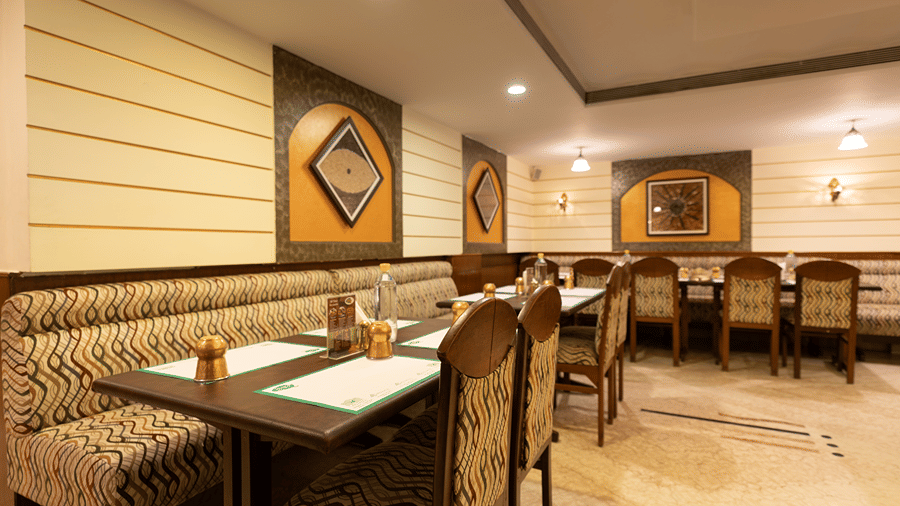 Seating arrangements inside the best restaurant in Bangalore situated at Hotel Pai Comforts, JP Nagar.
