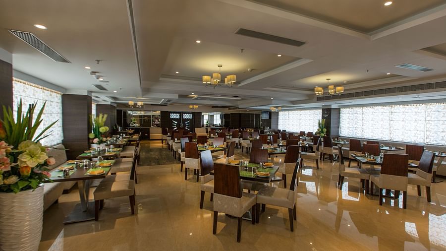 An overview of the seating arrangements inside Plaintain Leaf Restaurant Hotel Pai Viceroy Tirupathi 