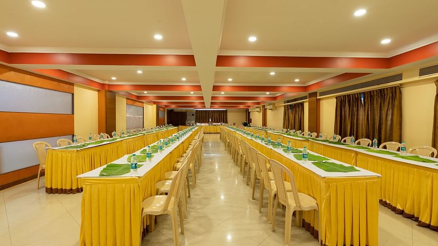 seating arrangements for food during a wedding at Hotel Pai Vista, Mysore