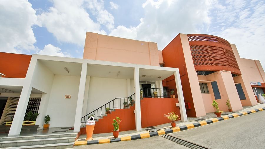 An exterior low-high view of the dormitory in Ramoji Film City at Hotel Sahara - Dormitory Building in Hyderabad.