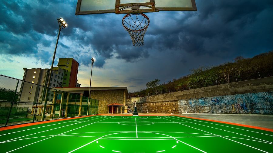 A shot the basketball court during dusk at Tara, Comfort Hotel in Hyderabad - Ramoji Film City.