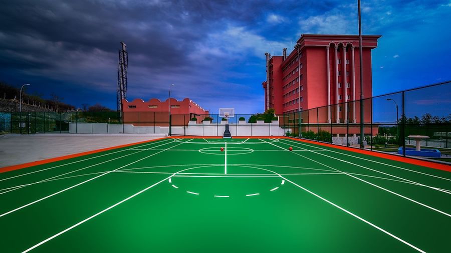 A shot the basketball court during dusk at Tara, Comfort Hotel in Hyderabad - Ramoji Film City.