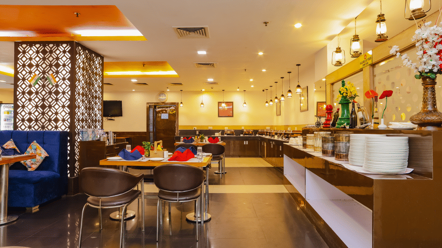 The seating and serving counter within a hotel restaurant - Hyphen Grand, Haridwar