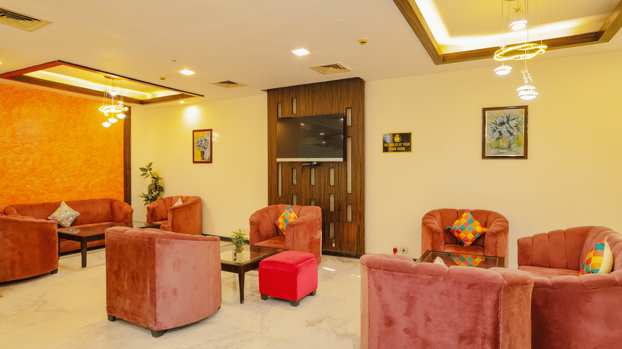 A hotel common area or corridor with contemporary furniture and decor - Hyphen Grand, Haridwar