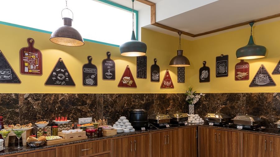 A colourful buffet display, featuring a variety of dishes in a contemporary restaurant setting | Inde Hotel Cyber City 