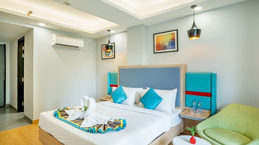 An image of a king size bedroom | Inde Hotel Golf Course Extension