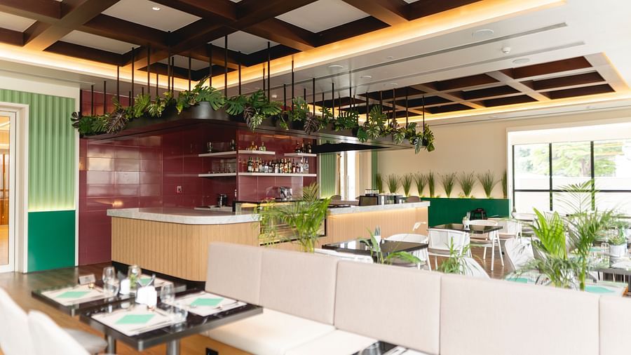 Meli-Melo Restaurant at KertelSuites, featuring elegant seating arrangements and stylish ceiling lights