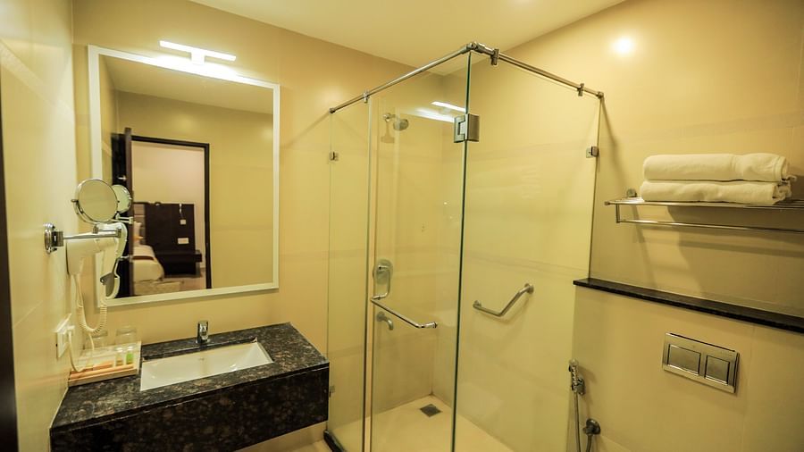 A sleek and contemporary washroom designed for comfort and convenience, featuring modern fixtures and stylish amenities.