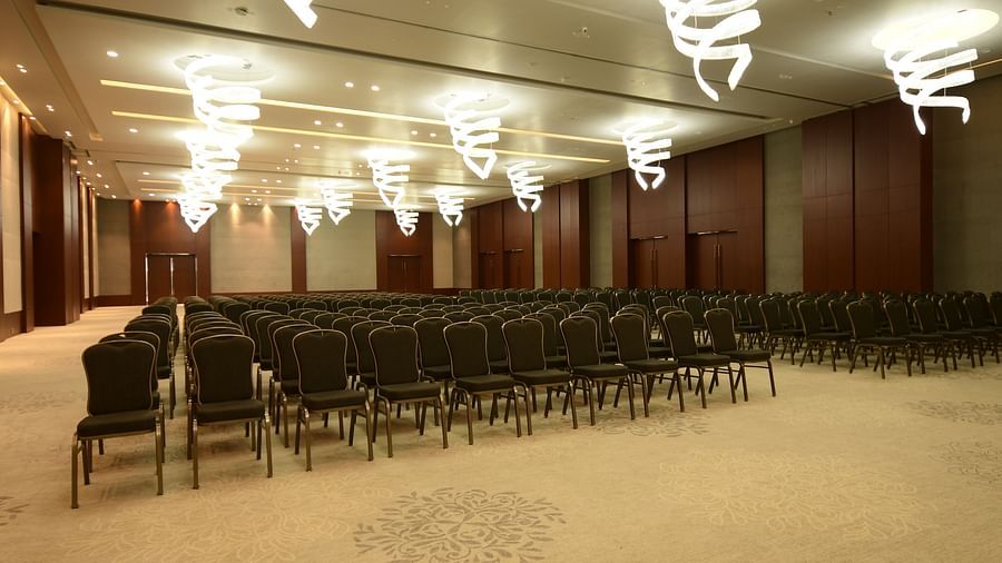 An event space with chairs neatly arranged on both sides