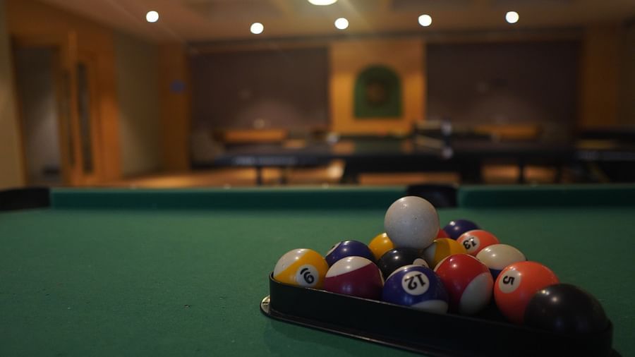 Pool table with balls neatly arranged
